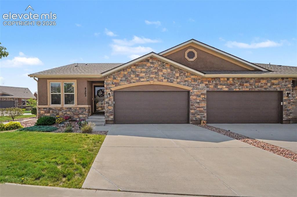 Image 2 of 32: Spacious 2-car attached garage, and professionally maintained landscaping