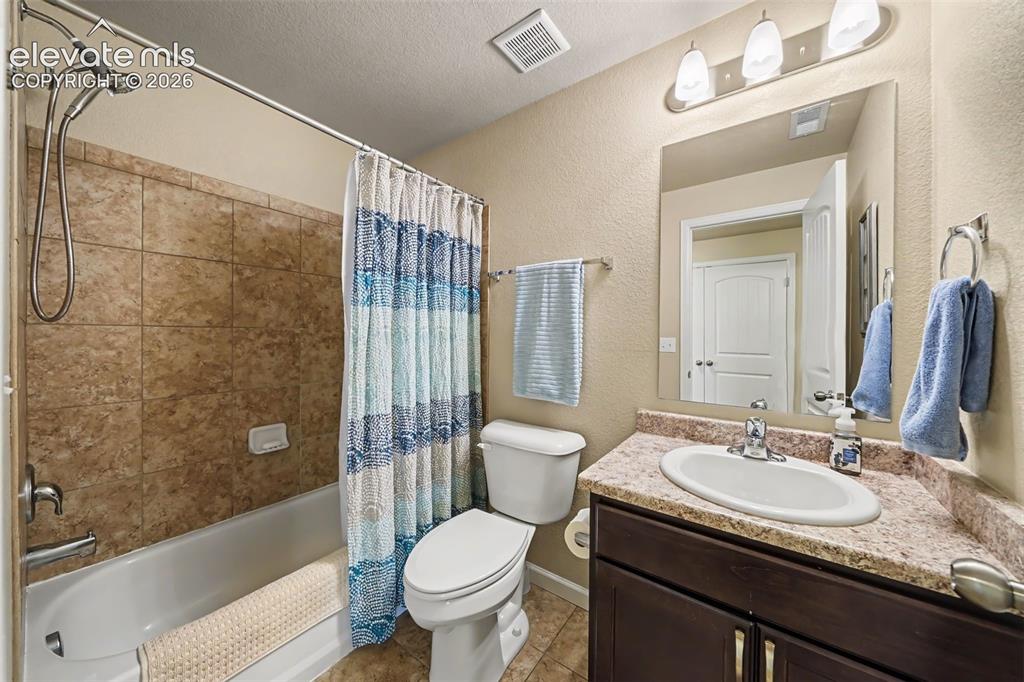 Image 21 of 32: Generously sized full basement bedroom providing additional living space an