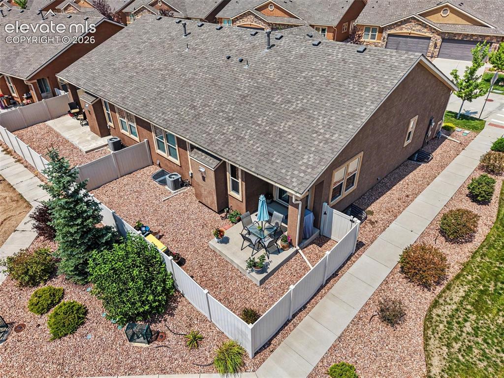 Image 24 of 32: Situated on a desirable corner lot, offering added privacy, extra space, an