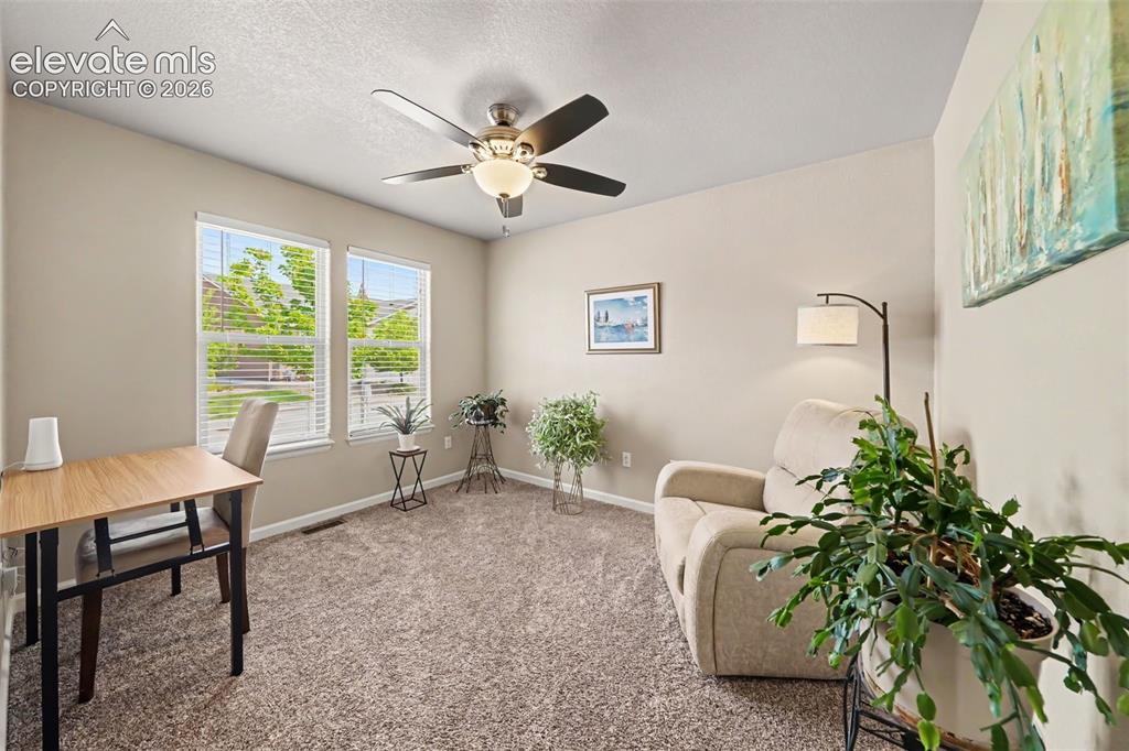 Image 6 of 32: Dedicated office with an elegant arched entry, providing the perfect space 