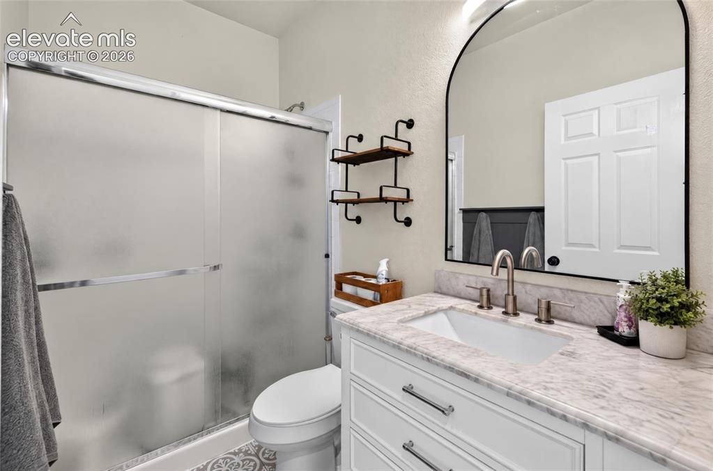 Image 12 of 44: Main level full bath