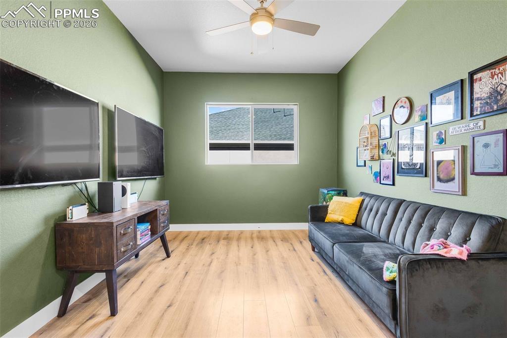 Image 14 of 38: office with french doors and great natural light on the main level