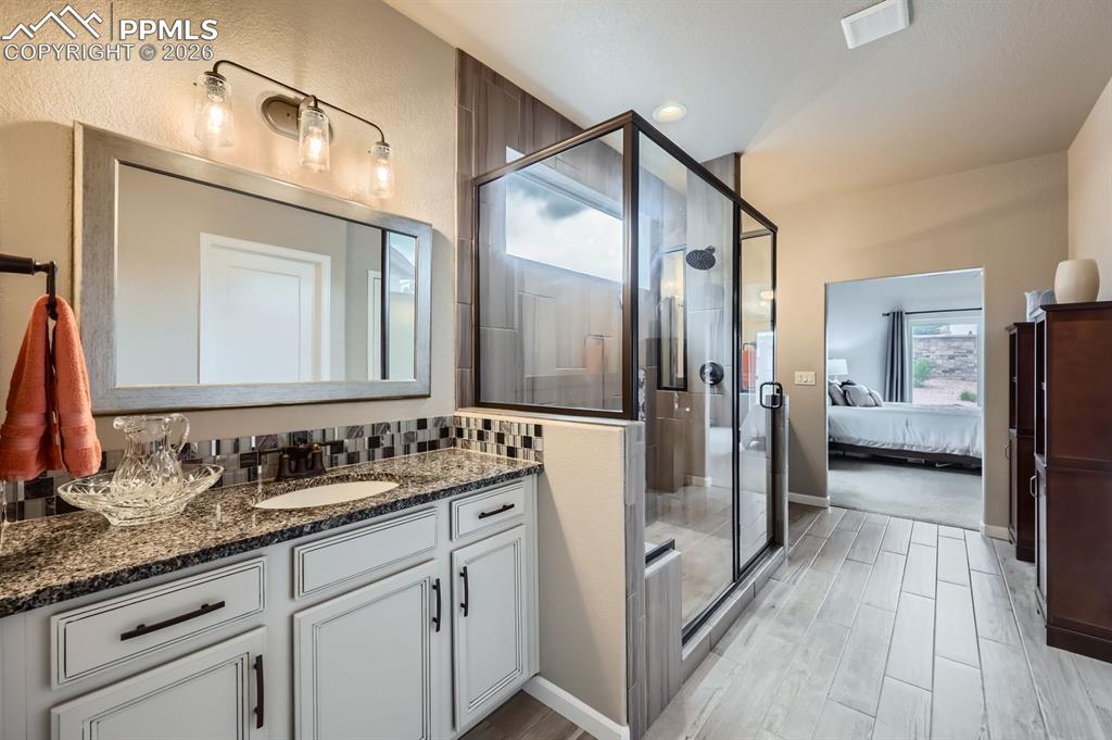 Image 13 of 27: Master Bathroom