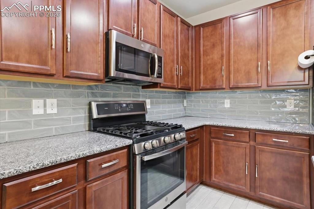 Image 12 of 38: Kitchen