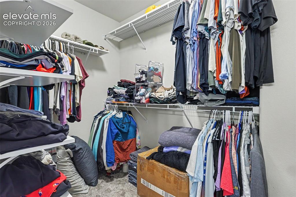 Image 18 of 34: Primary Closet