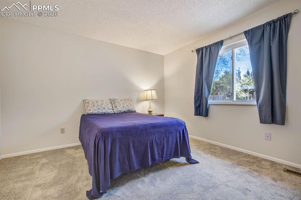 Image 11 of 43: Bedroom