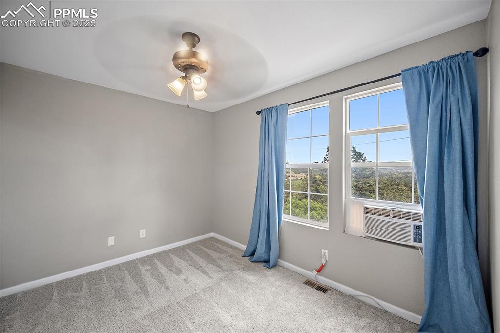 Image 11 of 28: the second bedroom has beautiful views!