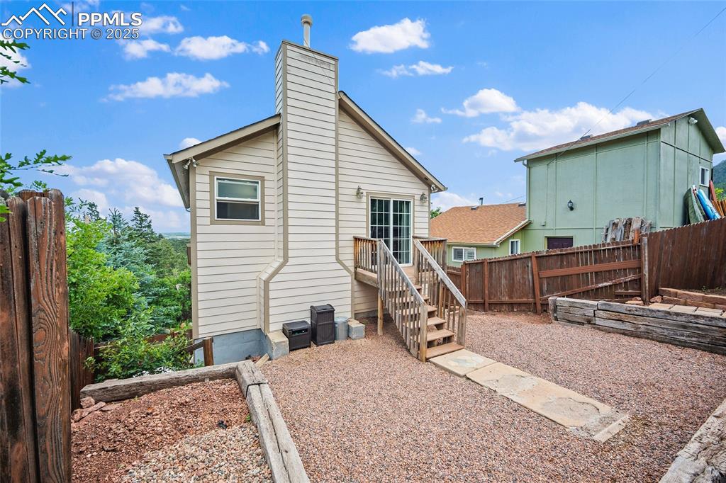 Image 16 of 28: imagine having a fire pit with friends back here!