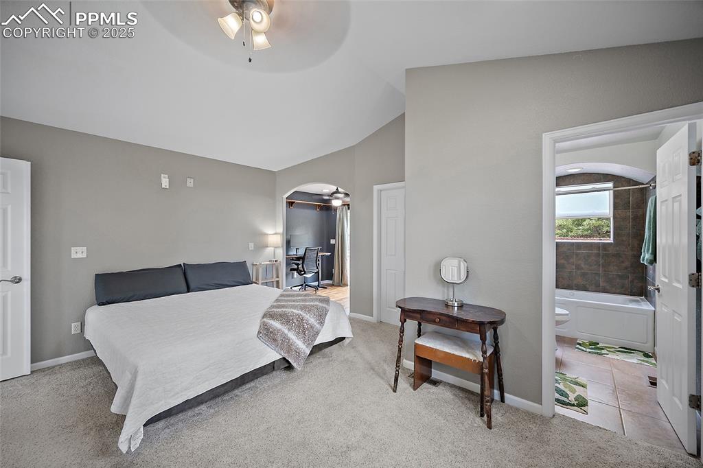 Image 7 of 28: a true en-suite primary bedroom