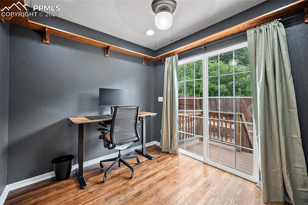 Image 8 of 28: this flex space could be an office, reading nook, or just a relaxing sittin