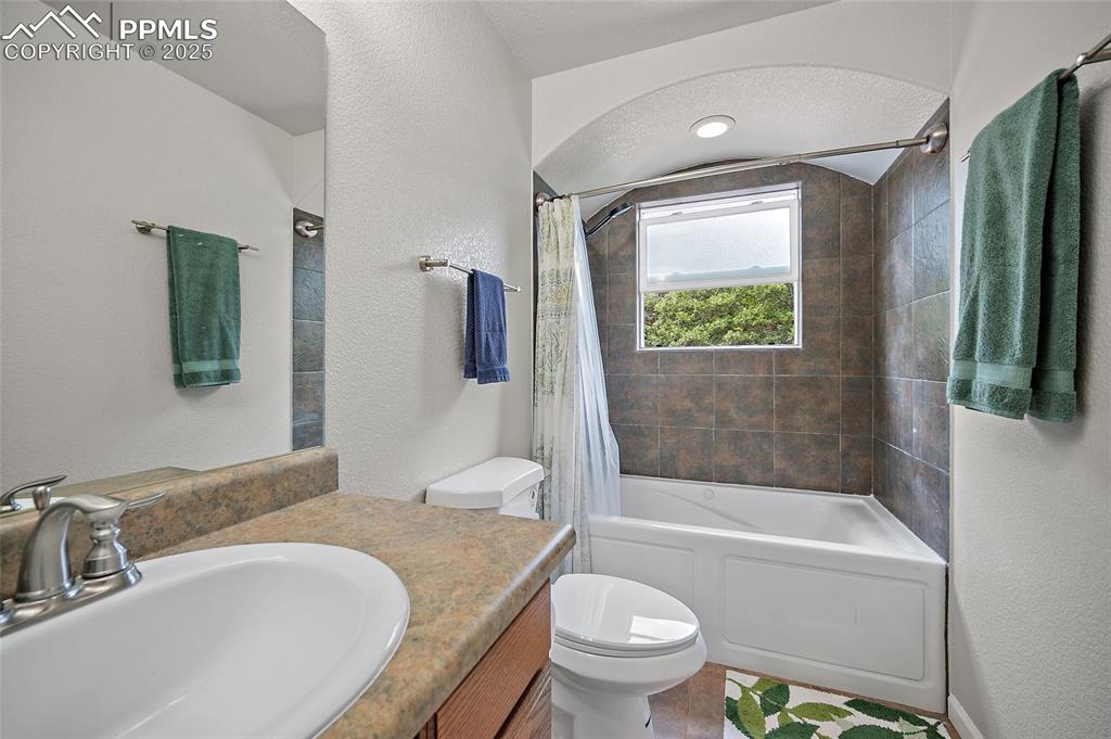 Image 9 of 28: gorgeous tile and ample natural light