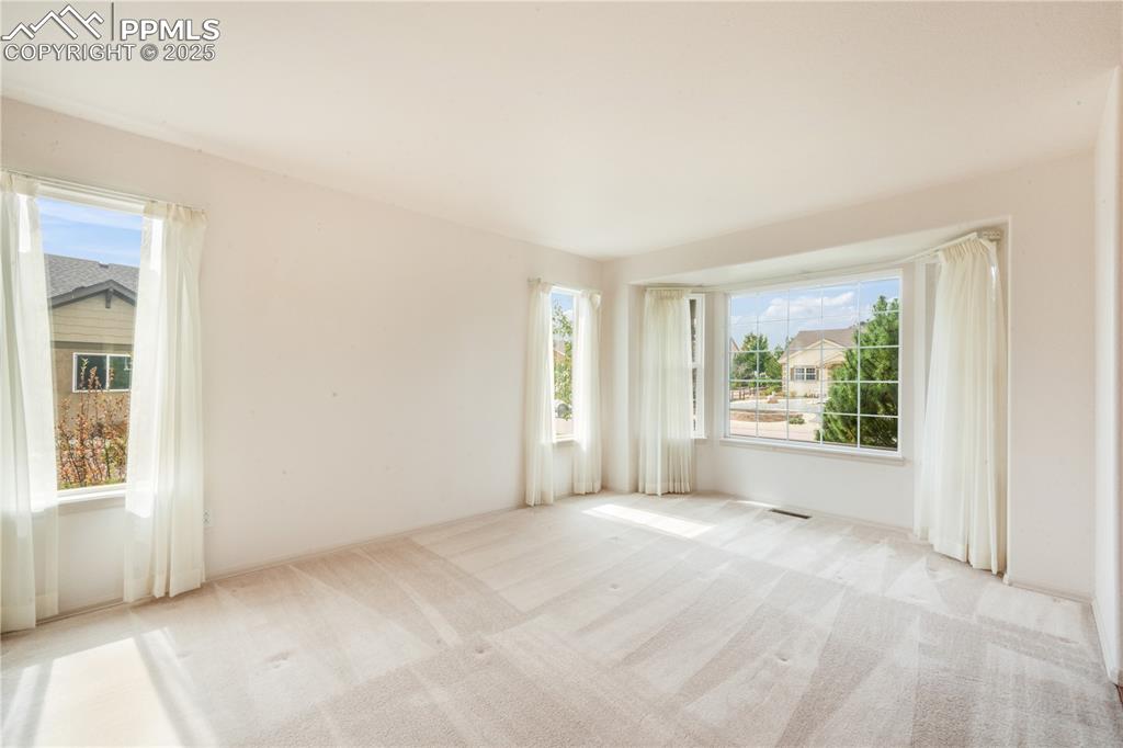 Image 16 of 50: Formal Living Room