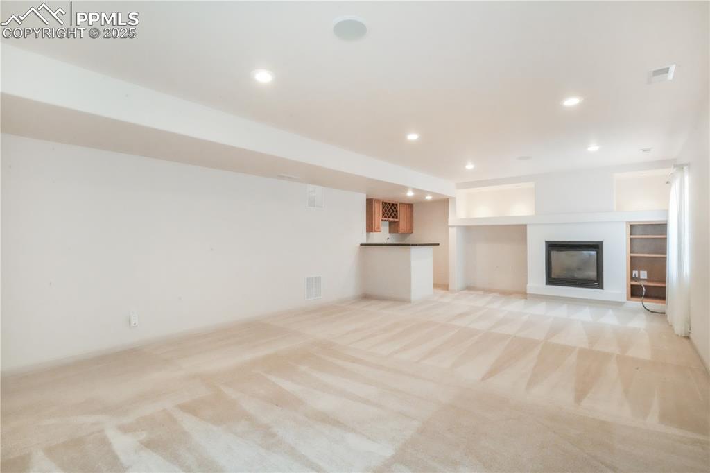 Image 34 of 50: Rec Room In Basement Is Entertainment Central!