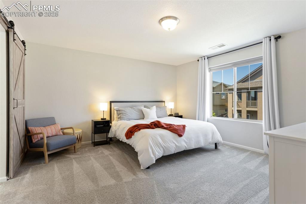 Image 19 of 40: Master Bedroom