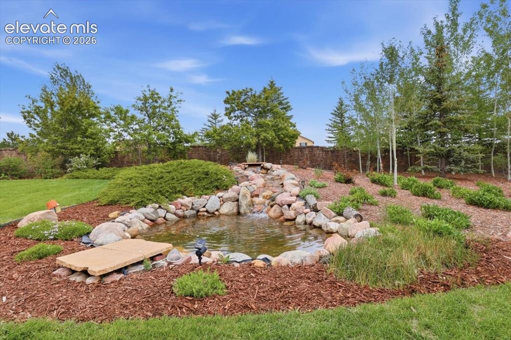 Image 31 of 32: Recirculating waterfall and pond!