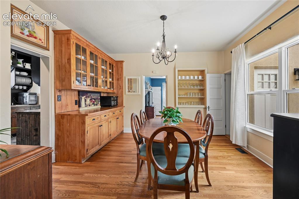 Image 10 of 50: Dining room with built-ins