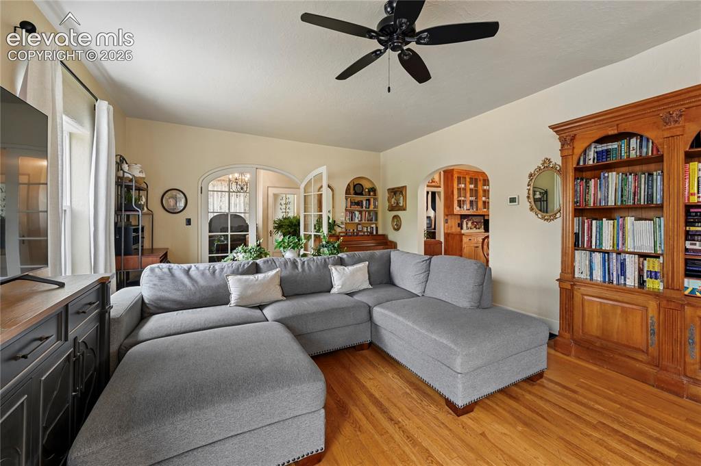Image 9 of 50: Living room looking toward dining room and entry