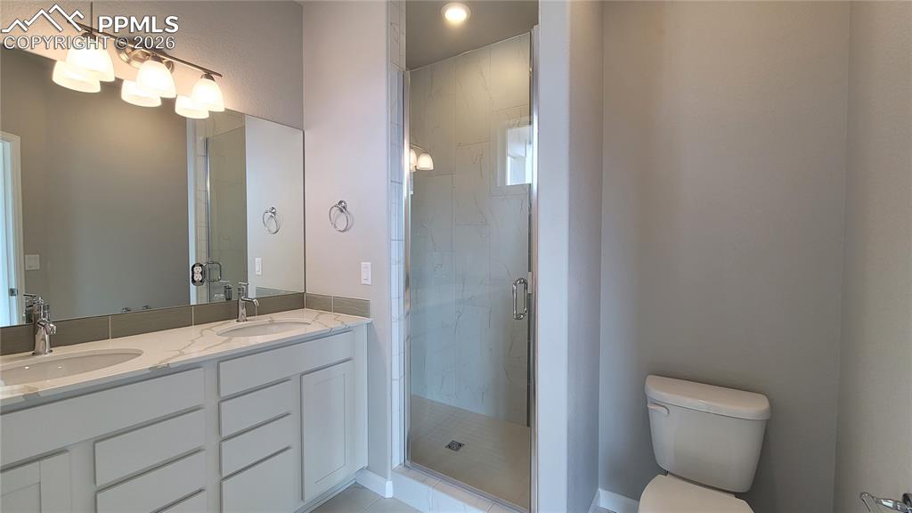Image 15 of 24: Primary Suite is accompanied with a plush bathroom, walk-in closet, and a c