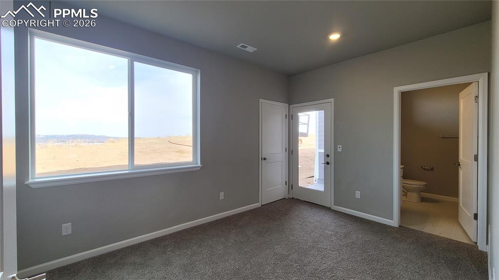 Image 4 of 24: Welcome home! Inviting Entryway with LVP flooring and access to garage! 