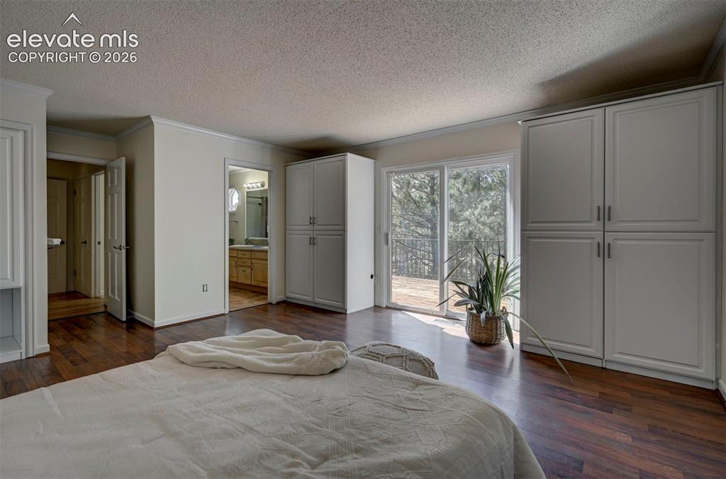 Image 12 of 43: Main floor primary bedroom.
