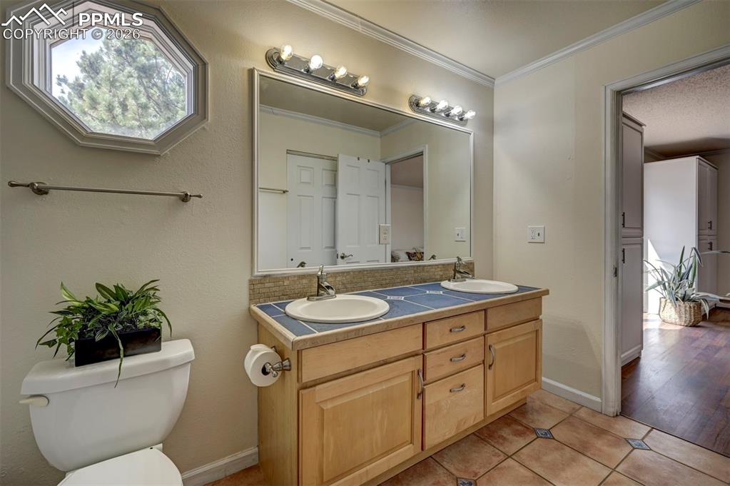 Image 14 of 43: Main floor primary bathroom.