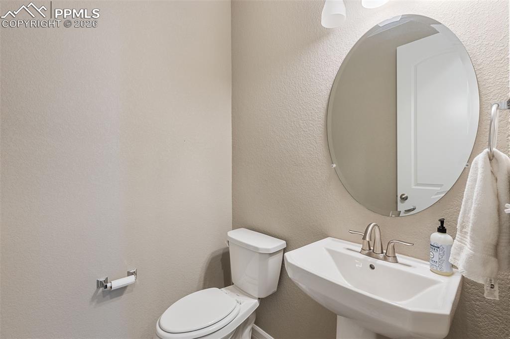 Image 18 of 49: Main Level Half Bath