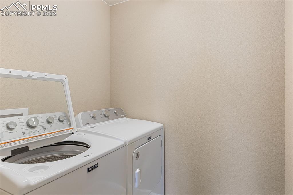 Image 32 of 49: Upstairs Laundry Room