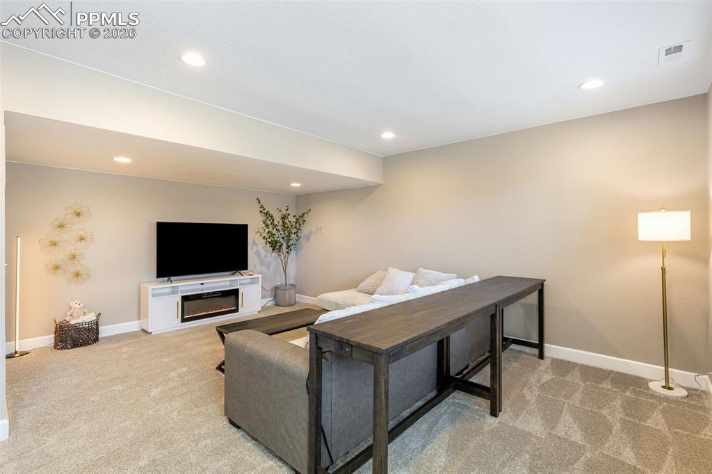 Image 36 of 49: Spacious Basement Living Area