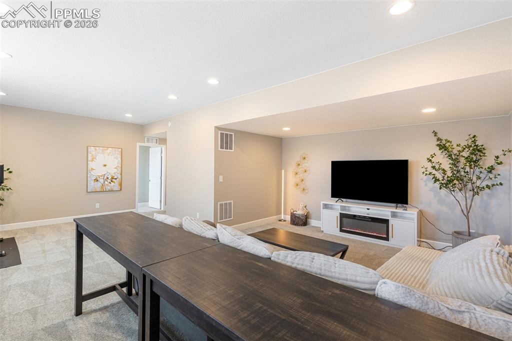 Image 37 of 49: Spacious Basement Living Area