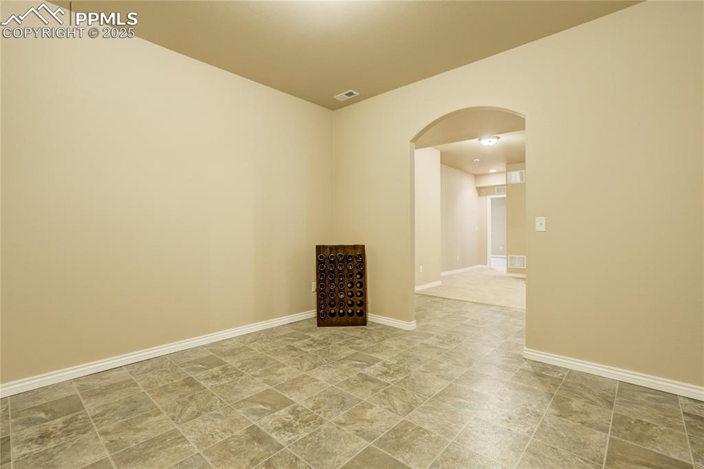 Image 35 of 50: Bonus space perfect for a gym, hobby room, playroom, or studio — whatever y