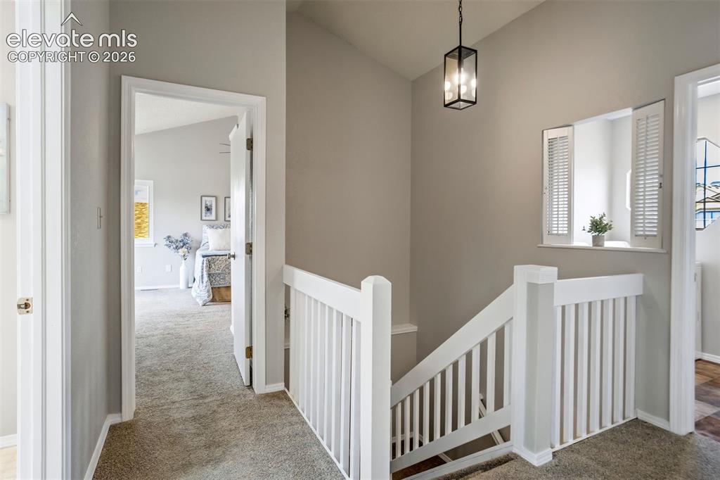 Image 21 of 47: Upstairs with Laundry Room
