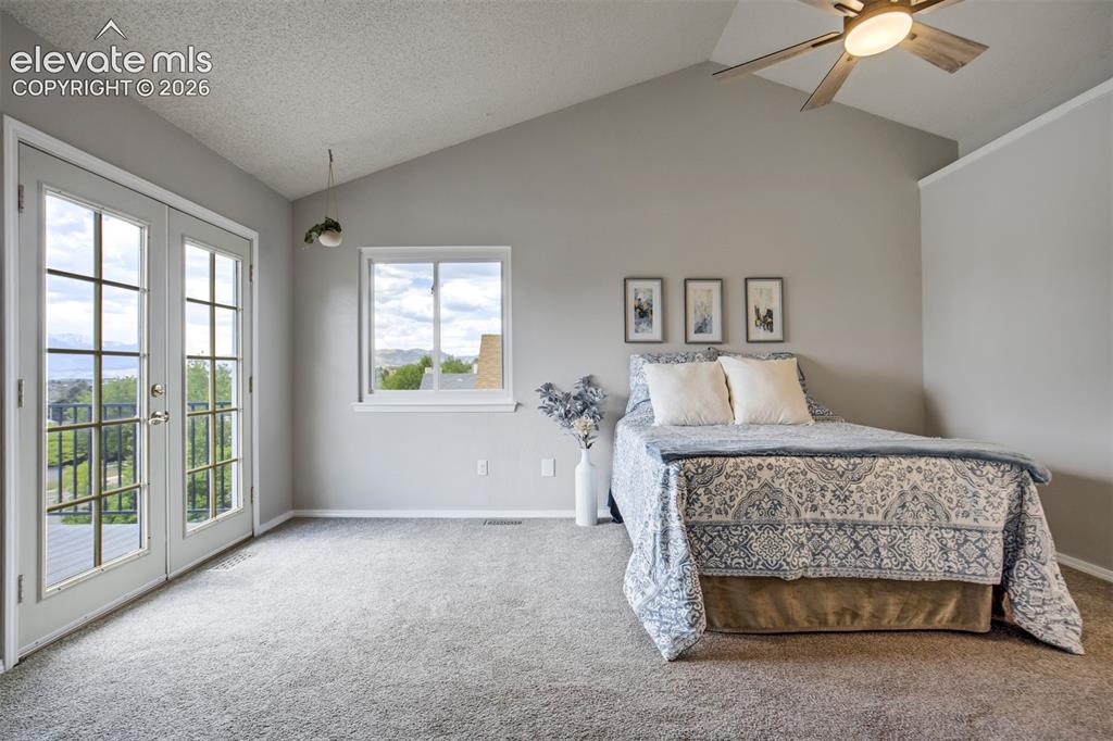 Image 22 of 47: Primary Bedroom with Balcony
