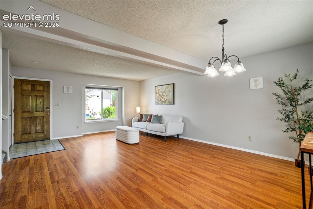 Image 4 of 47: Spacious Entry with Living/Dining Area