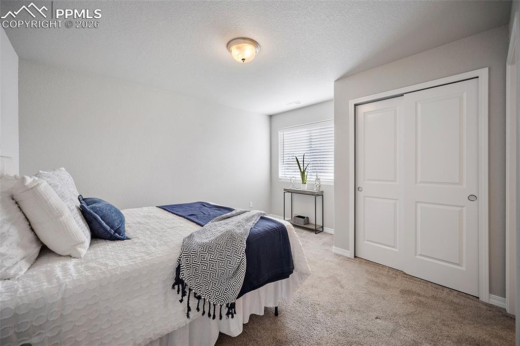 Image 13 of 23: Bedroom