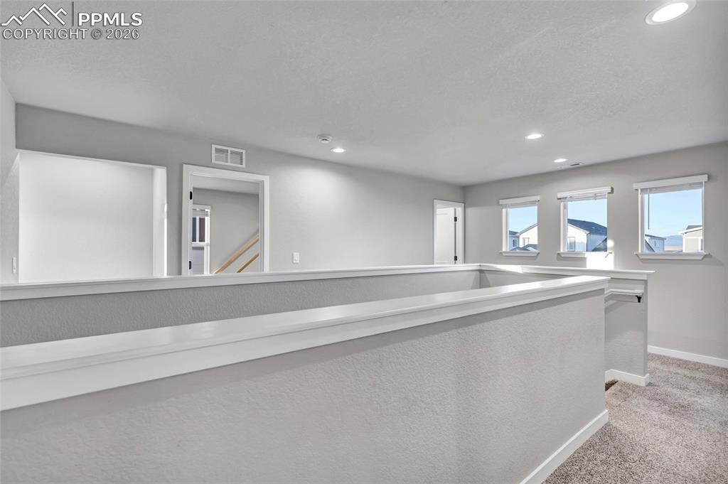 Image 26 of 49: Upper Level Open Hallway