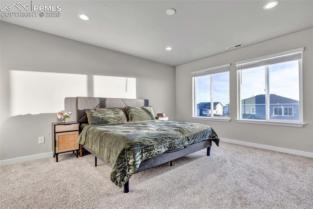 Image 27 of 49: Primary Bedroom