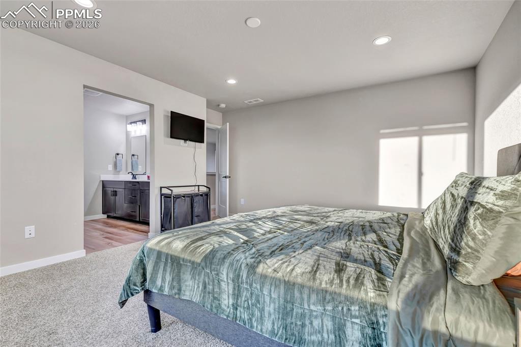 Image 28 of 49: Primary Bedroom