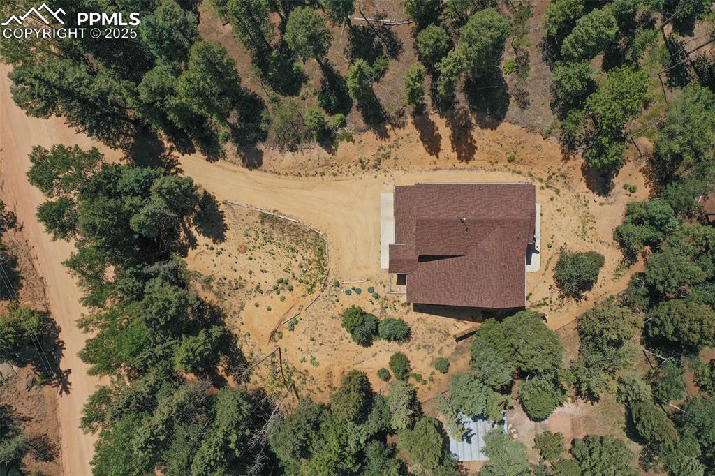 Image 10 of 46: Aerial view of property and surrounding area