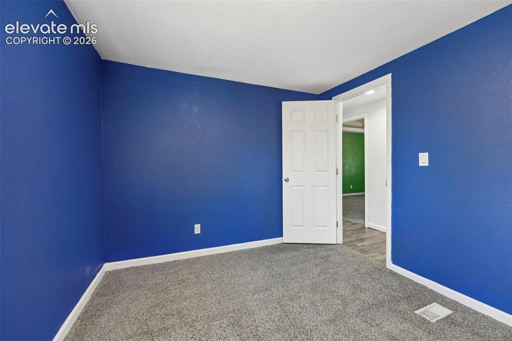 Image 13 of 49: Bedroom
