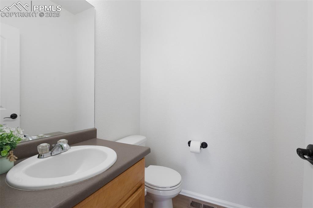 Image 16 of 49: Half Bath on the main level.