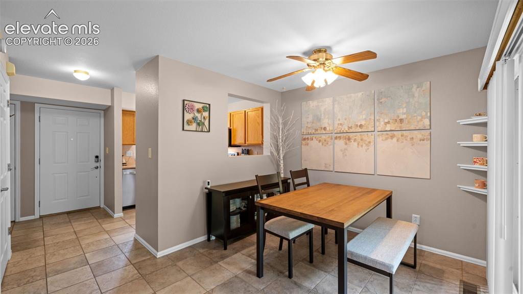 Image 11 of 28: Foyer and Dining have Custom Tile Floors