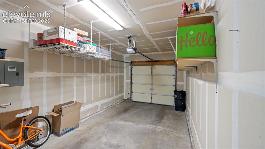 Image 25 of 28: Attached Garage ~ New Opener