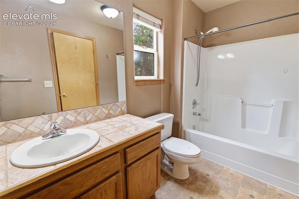 Image 13 of 40: Upper Level Bath