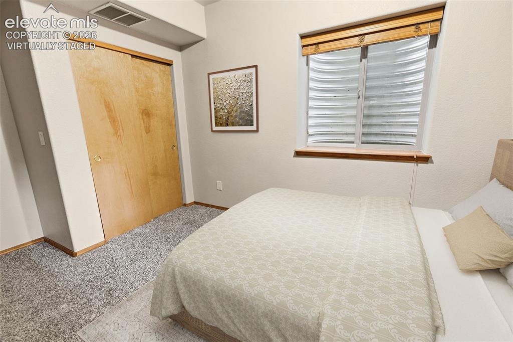 Image 19 of 40: Lower Level Bedroom 4 - Virtually Staged