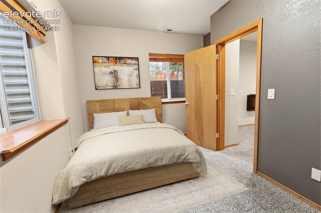 Image 20 of 40: Lower Level Bedroom 4 - Virtually Staged