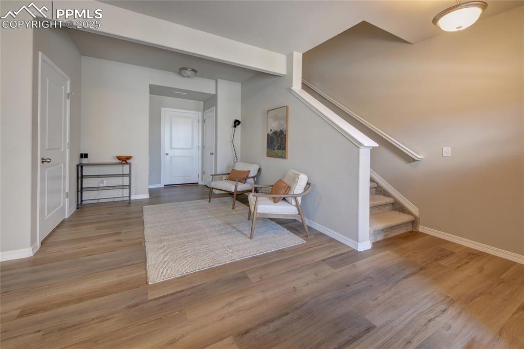 Image 3 of 38: Lower level entry with stairs leading to the main level.