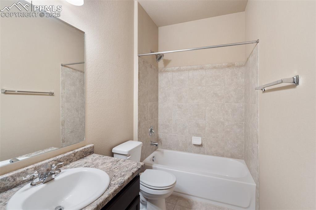 Image 23 of 45: Main Level Hall Bathroom - Full bath featuring shower / bathtub combination