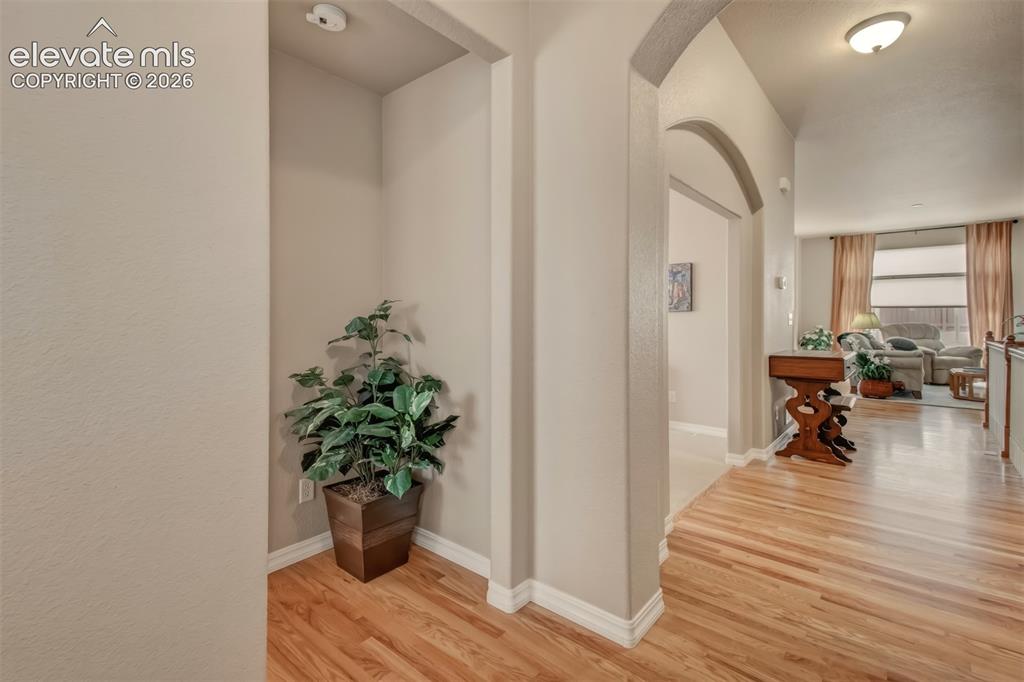 Image 13 of 35: Hall to secondary bedroom & Bathroom
