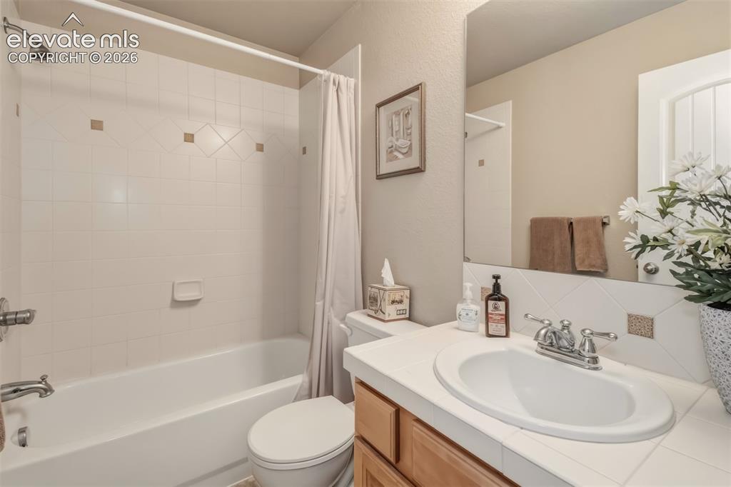 Image 29 of 35: Full bathroom in basement