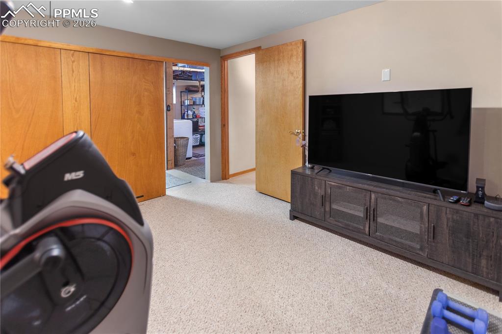 Image 26 of 37: Lower Level Workout room office - Office - Non Conforming Bedroom 4